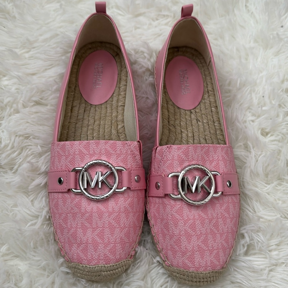 Pink Michael Kors flats. Never worn.